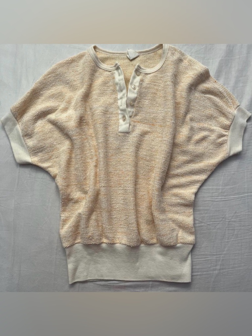 Cream and white vintage style 70s knit top with a relaxed fit